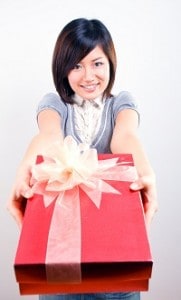 Woman-holding-present-cropped