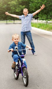 teaching a teenager to ride a bike