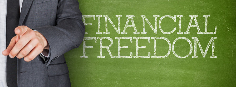 Financial freedom on blackboard with businessman