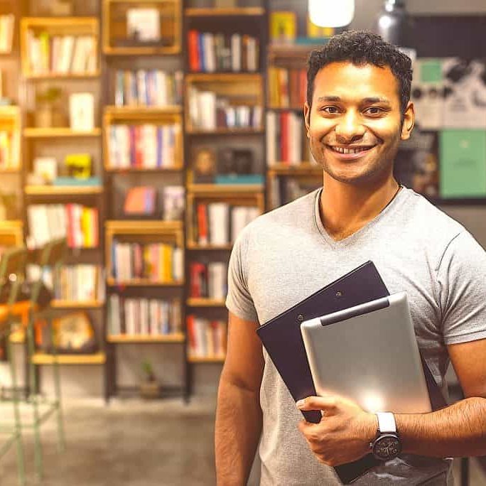 black student in library